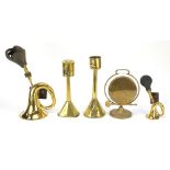 19th century and later brassware comprising two whale oil lamps, two car horns and a gong, the