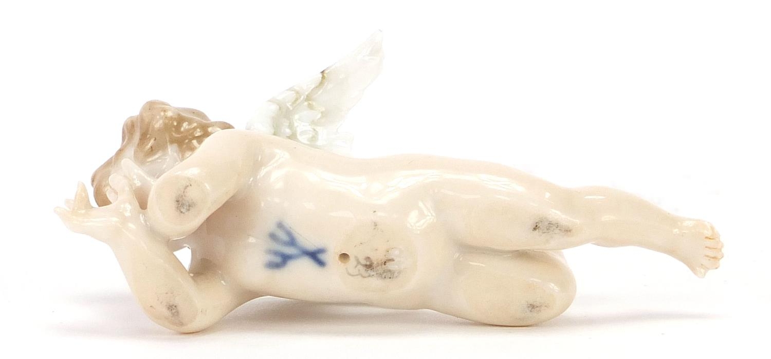 19th century Meissen style porcelain figure of Putti, 8.5cm in length : For Further Condition - Image 3 of 4