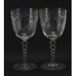 Pair of Edwardian cut glass wine glasses etched with flowers, each 19.5cm high : For Further
