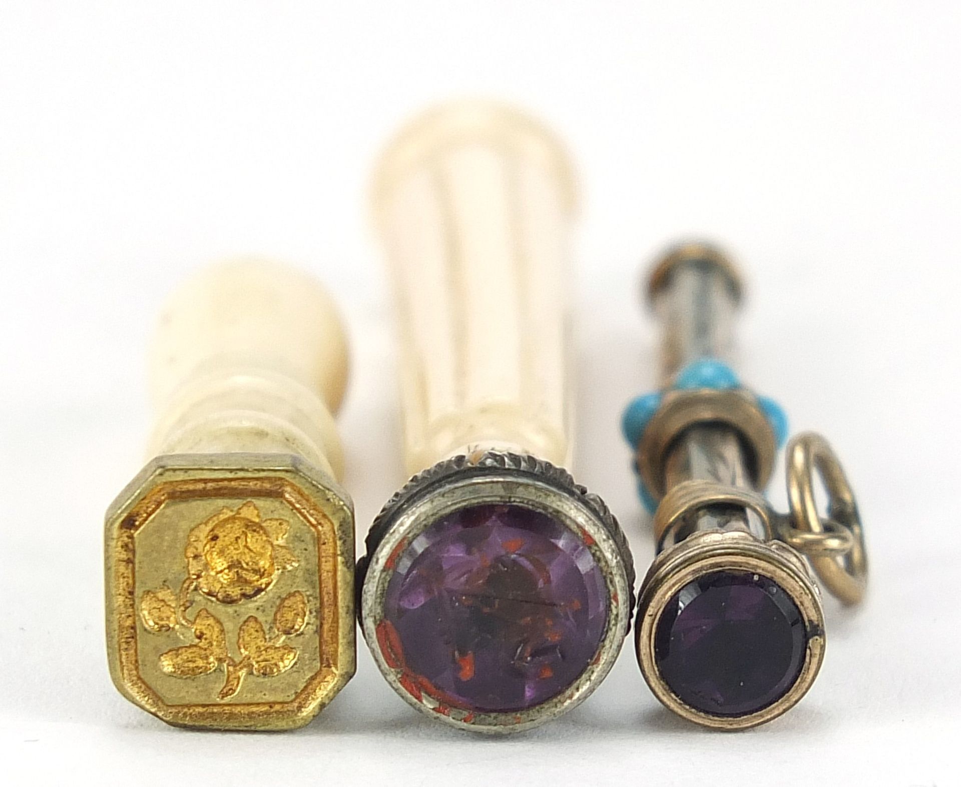 Victorian gold coloured metal propelling pencil set with turquoise and amethyst together with two - Image 3 of 3