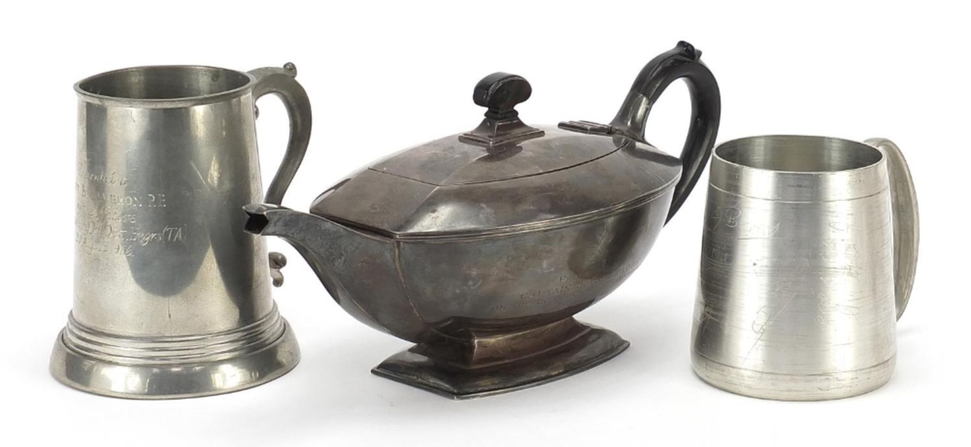 Military interest metalware presented to Captain B Cameron including a teapot presented by the