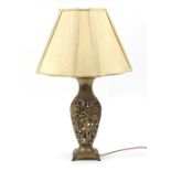 Ornate pierced brass floral baluster table lamp with silk lined shade, overall 75cm high : For