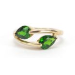 9ct gold green stone crossover ring, possibly peridot, size J/K, 2.2g : For Further Condition