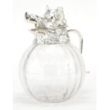 Manner of Valenti, globular glass carafe with silver plated mounts in the form of a boars head, 28cm
