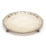 J B Chatterley & Sons Ltd, George V silver salver raised on four ball and claw feet, engraved
