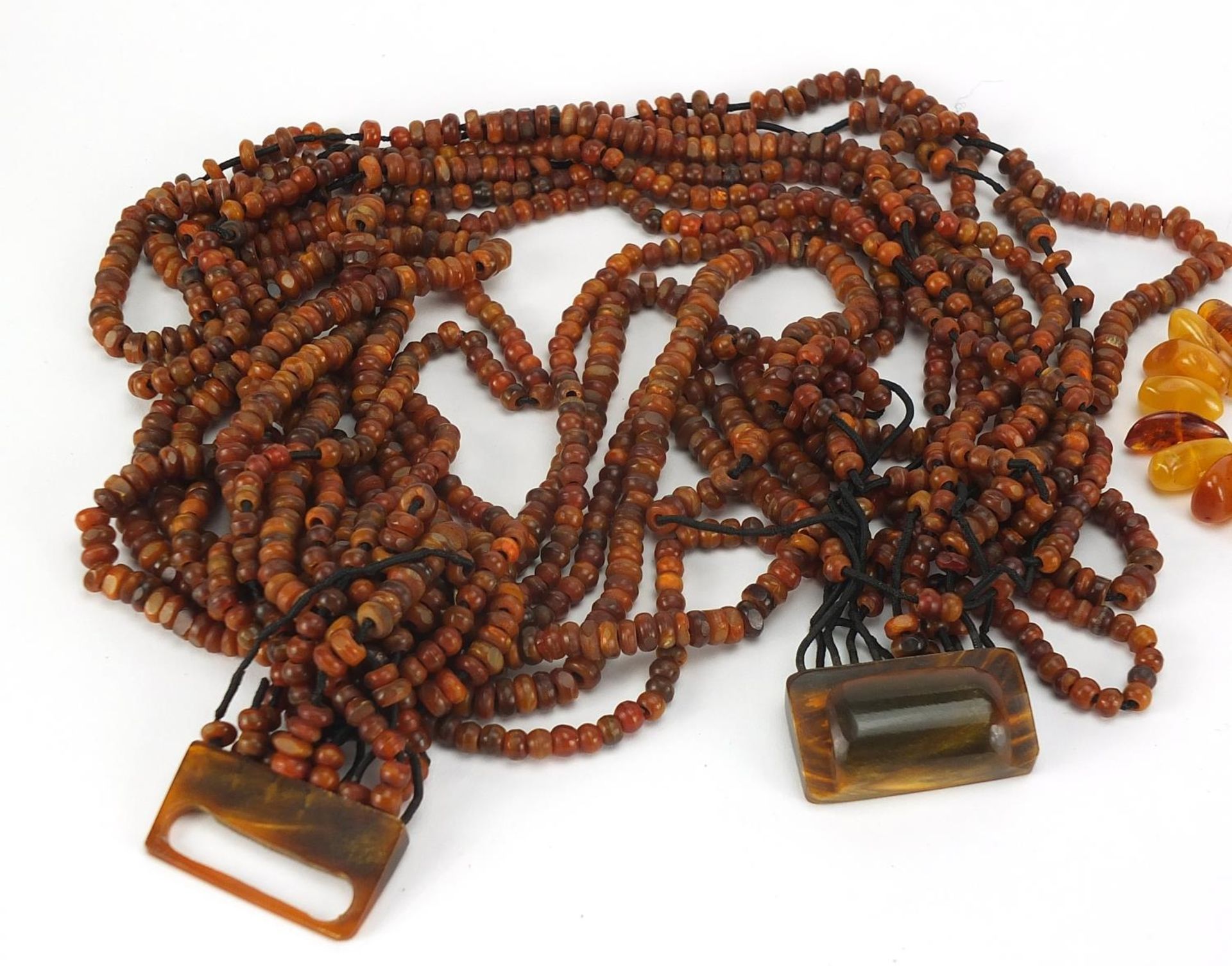 Butterscotch amber coloured bead necklace and a twelve row amber coloured necklace, total 244.2g : - Image 2 of 4