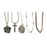 Five silver pendants on chains including a black and clear diamond example : For Further Condition