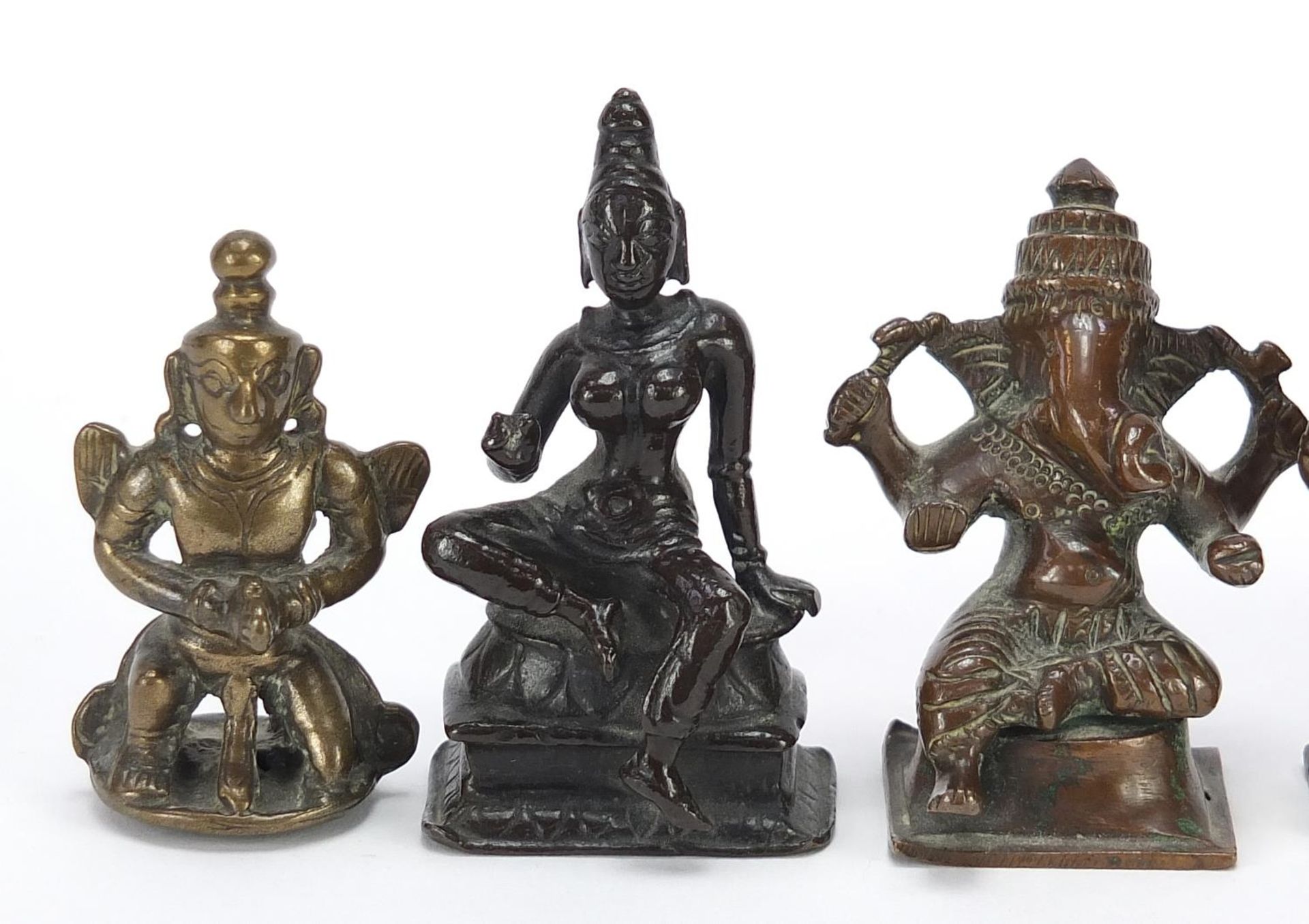 Four Indian patinated bronze votive figures and a bird weight, the largest 6.5cm high : For - Bild 2 aus 8