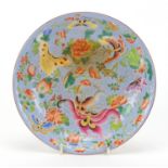 Chinese porcelain shallow dish hand painted in the famille rose palette with butterflies amongst