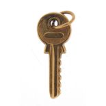 9ct gold key charm, 2.3cm high, 0.5g : For Further Condition Reports Please Visit Our Website -