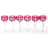 Set of six cranberry flashed cut glass wine goblets, each 20cm high : For Further Condition