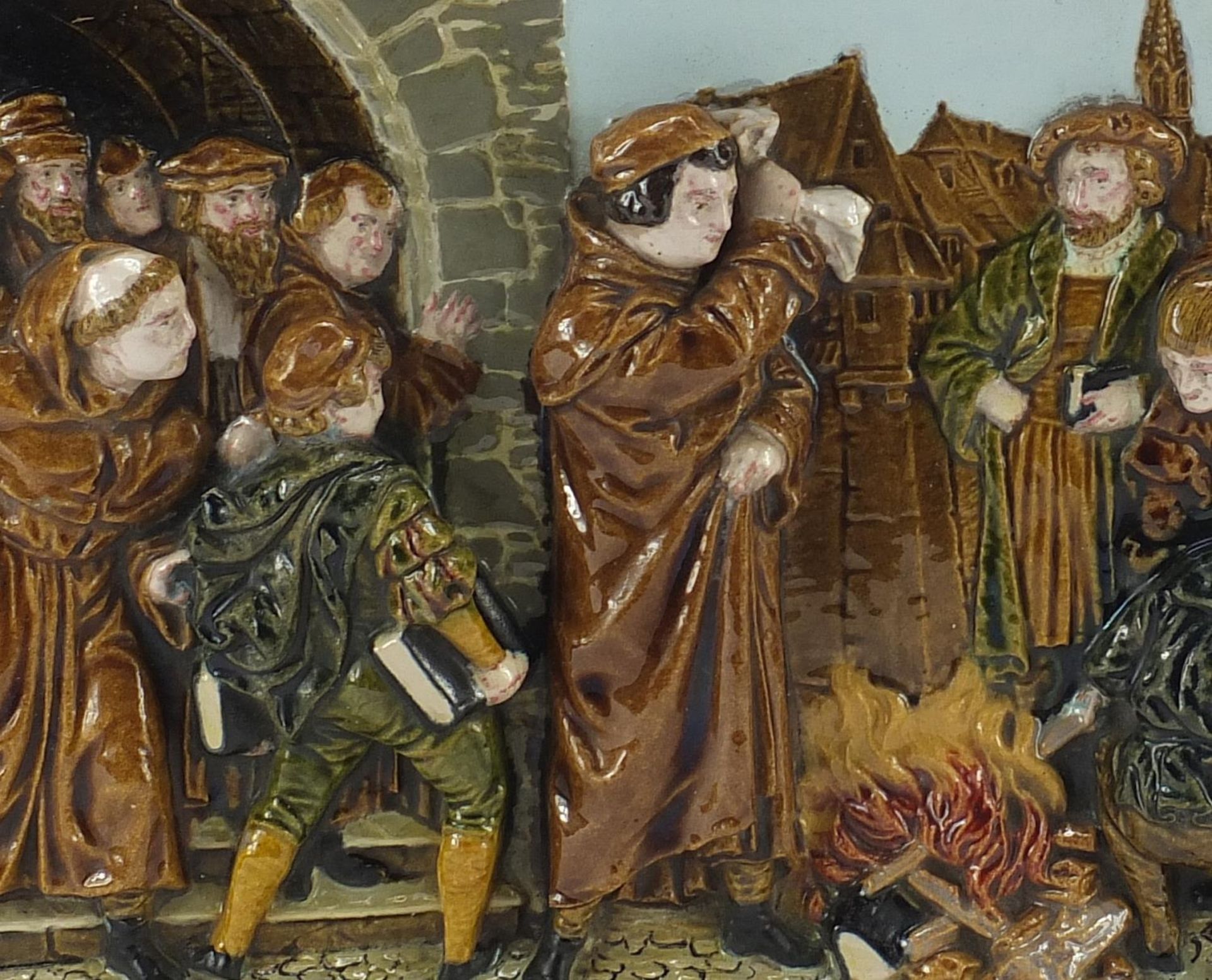 19th century Continental stoneware plaque decorated in relief with religious zealots burning - Image 3 of 8