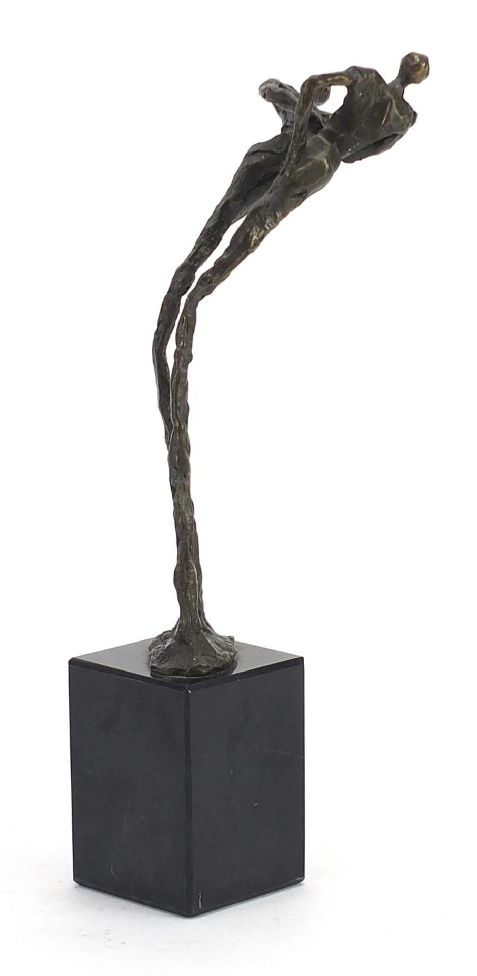 Modernist patinated bronze study of two figures raised on a square marble base, 25cm high : For