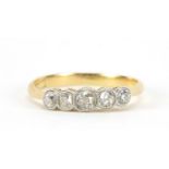 18ct gold graduated diamond five stone ring, the central diamond approximately 2.7mm x 2.5mm, size