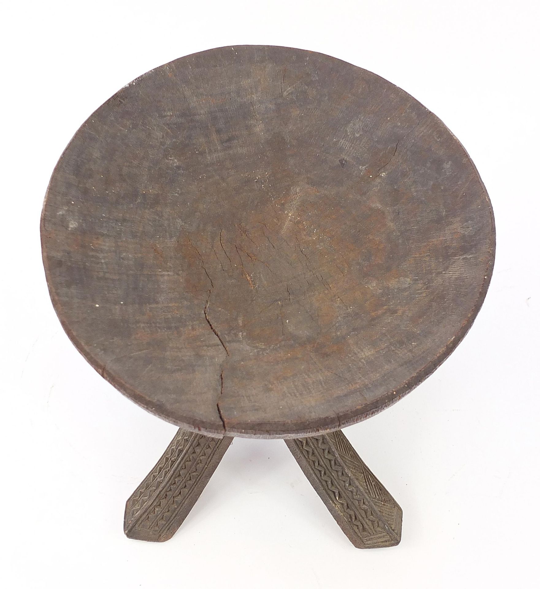 African tribal interest carved stool, 34cm high x 31cm in diameter - Image 2 of 4