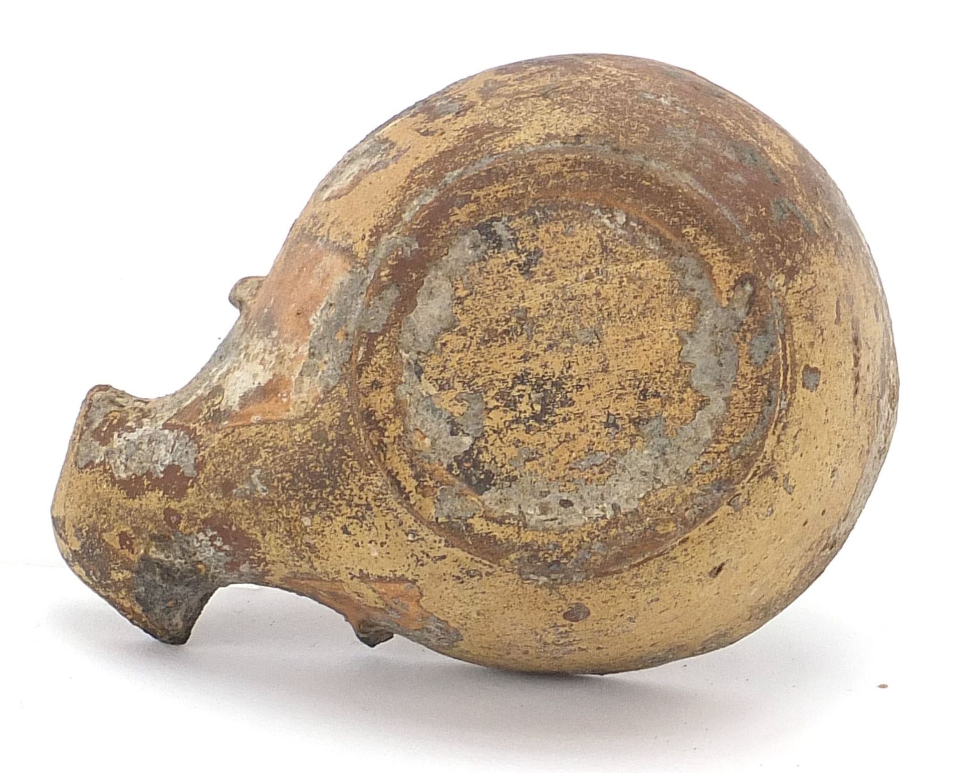 Roman terracotta oil lamp decorated in relief with a figure, 9cm in length - Image 5 of 5