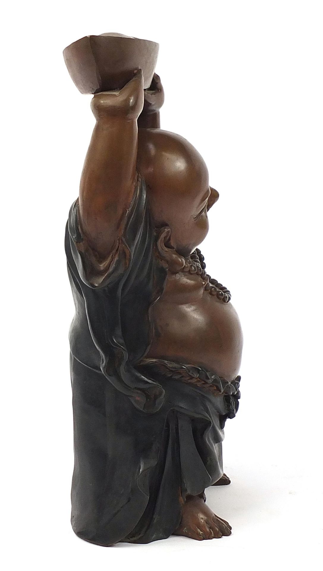 Large Chinese patinated bronze figure of Buddha with his hands above his head holding a vessel, 48cm - Image 4 of 6