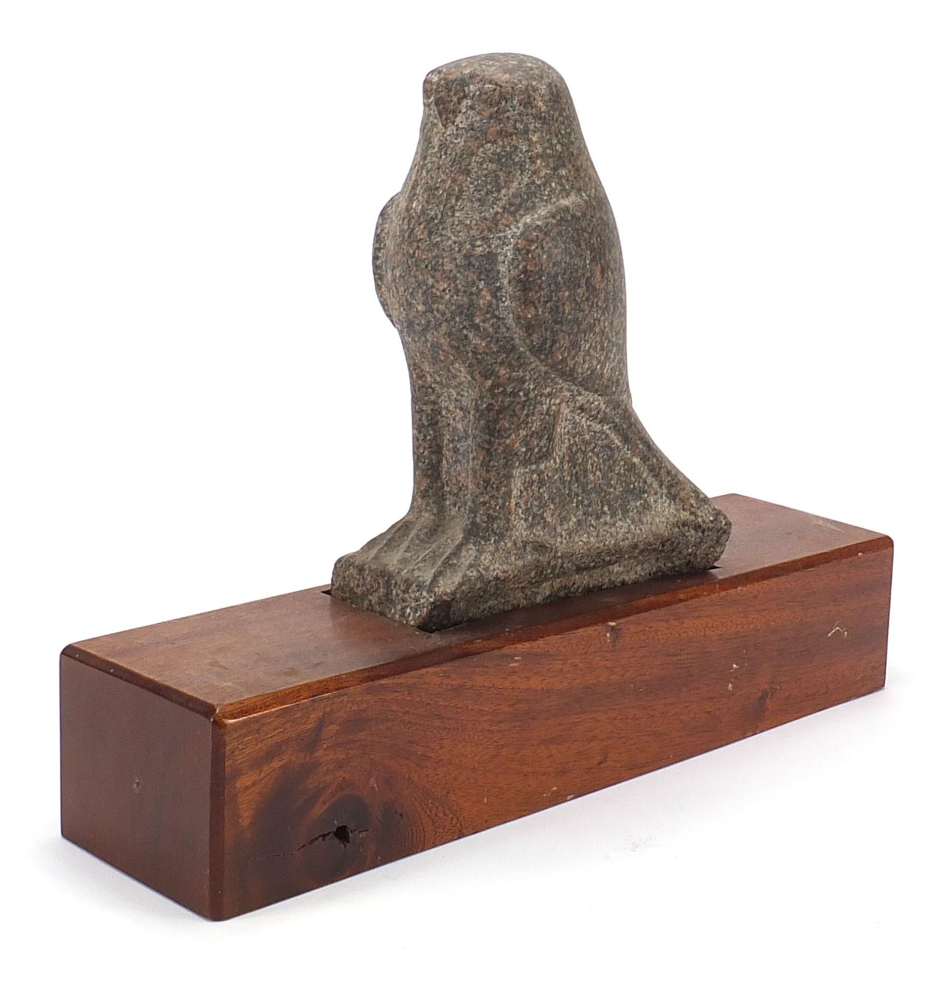 Large antique stone carving of a bird raised on a later wooden base, possibly Egyptian, 30cm high