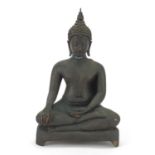Burmese patinated bronze figure of seated Buddha, 21.5cm high