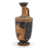 **WITHDRAWN** Attic pottery lekythos hand painted with a figure, 16cm high