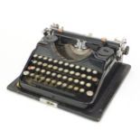 Vintage Continental black typewriter with carry case numbered R089332