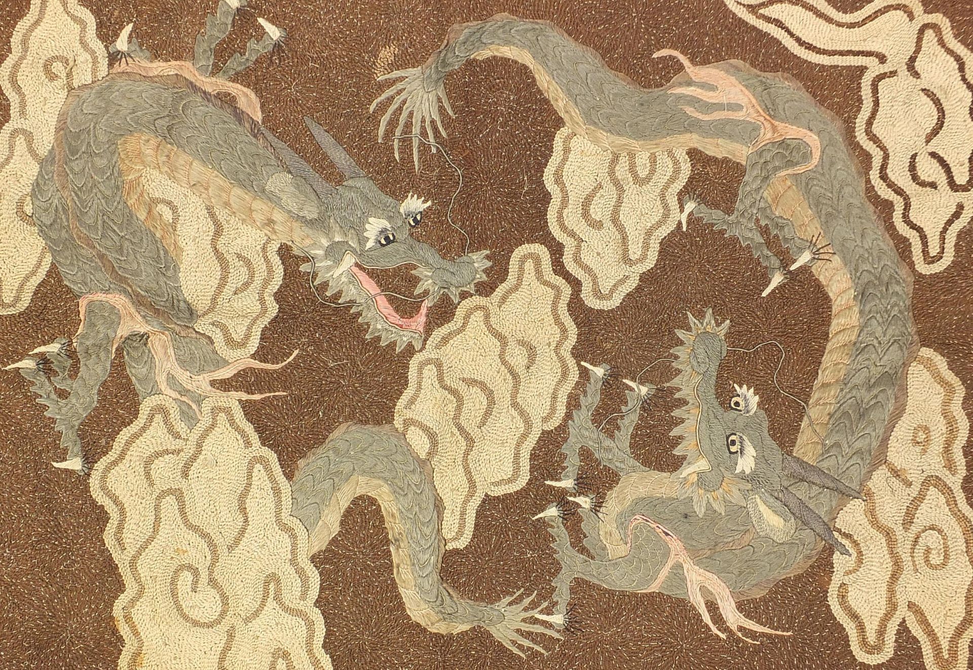 Chinese embroidered wall hanging depicting two three toed dragons amongst clouds, 102cm x 70cm - Image 2 of 4