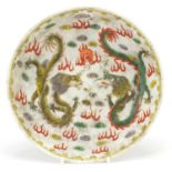 Chinese porcelain dragon dish hand painted in the wucai palette with two dragons chasing a flaming