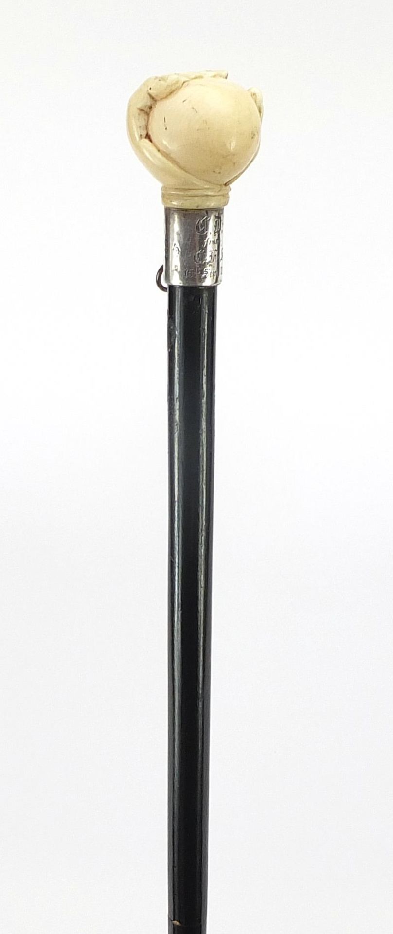 Ebony walking stick with carved silver pommel being in the form of a hand holding a ball, 90cm in - Image 5 of 8