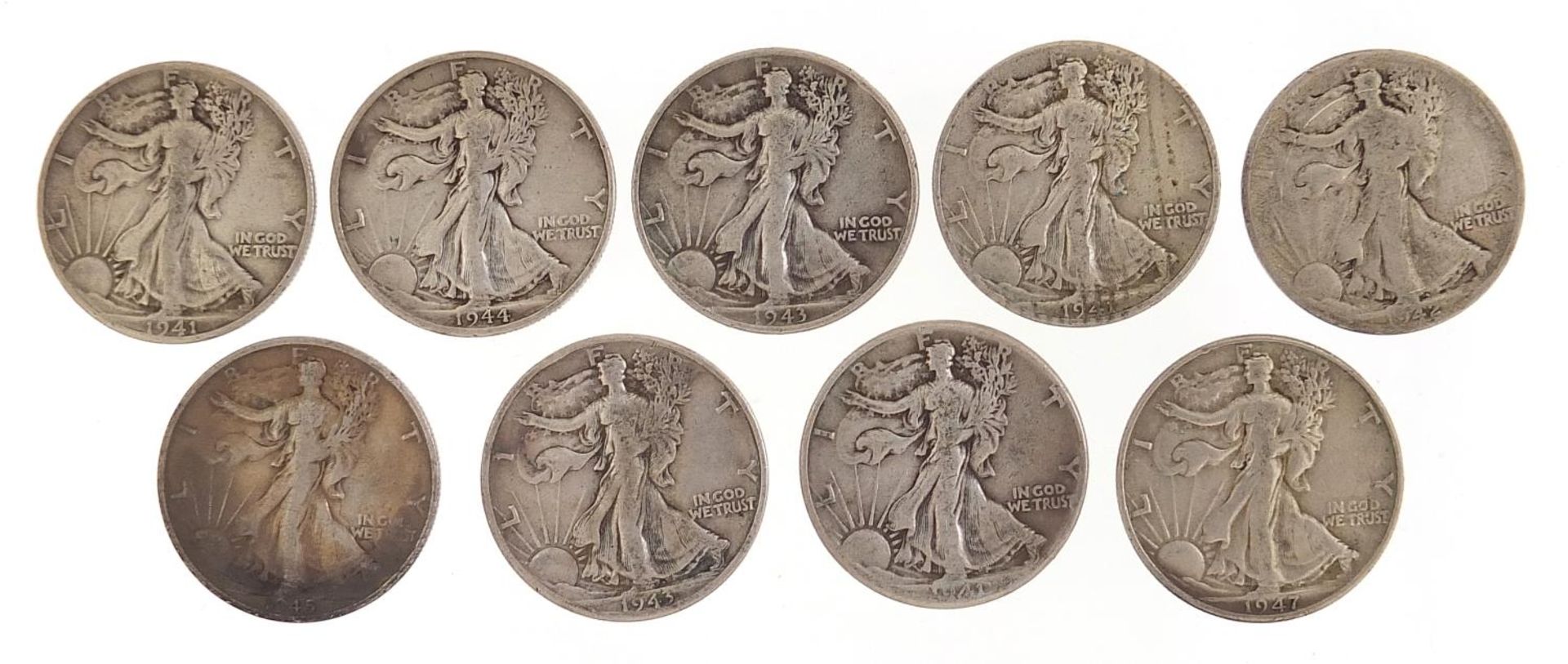 Nine 1940's United States of America Eagle half dollars, 111g