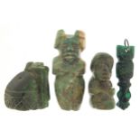 Four antique green stone carvings including a Hei-tiki style pendant, the largest 5.5cm high