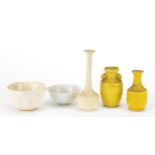 Chinese porcelain comprising two yellow vases, blanc de chine bowls and blanc de chine vase, the