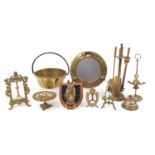 Items including porthole style mirror, brass preserve bucket, fireside set, brass frame, the largest