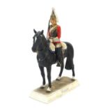 Goebel, West German military interest porcelain figure of a Life Guard on horseback, mounted on a
