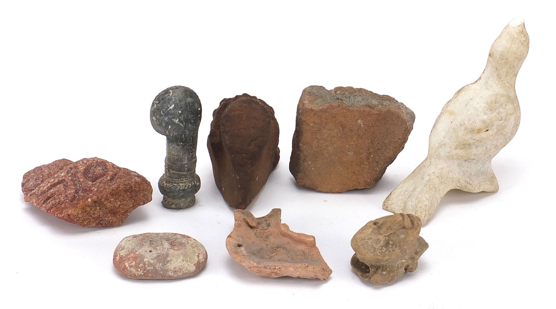 Stone antiquities including a marble carving of a bird and stone fragments, the largest 13cm high - Image 12 of 13
