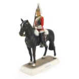 Goebel, West German military interest porcelain figure of a Life Guard on horseback, mounted on a