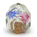 Multi facetted floral glass paperweight, 9cm high