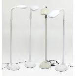 Four floor standing adjustable reading lamps, approximately 130cm high