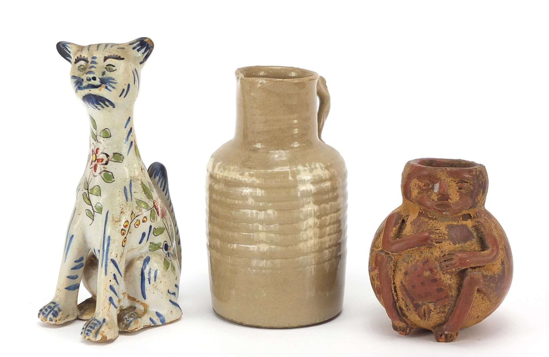 Pottery including a terracotta figural vase and Galle style faience glazed cat, the largest 12cm