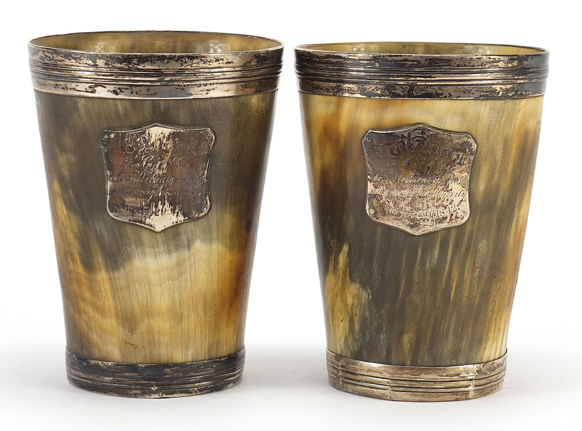 Pair of 19th century Scottish horn beakers with silver mounts, each 12.5cm high