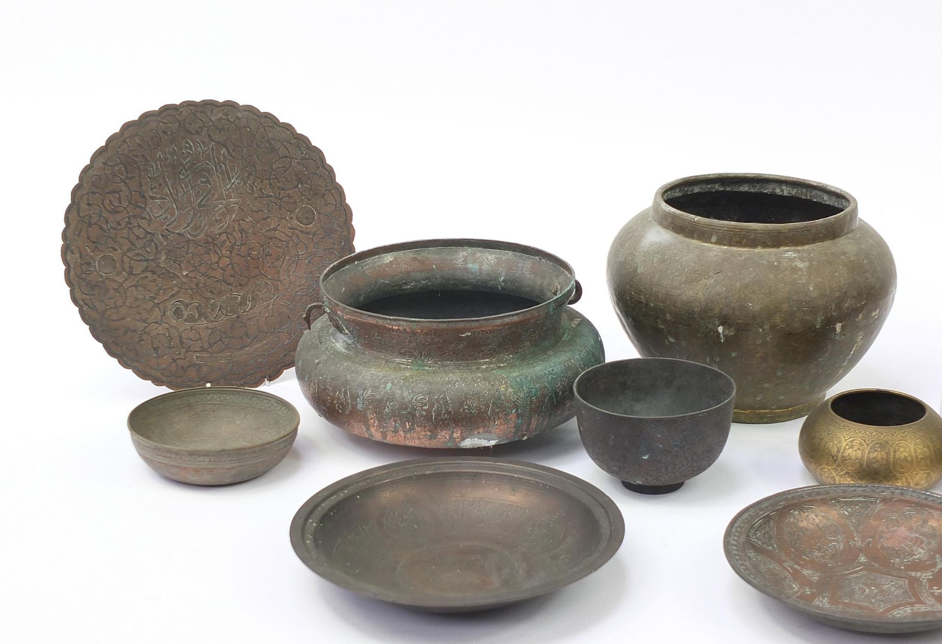 Indian, Islamic and Persian metalware, some with silver inlay including water pot, bowls and dishes, - Image 2 of 4