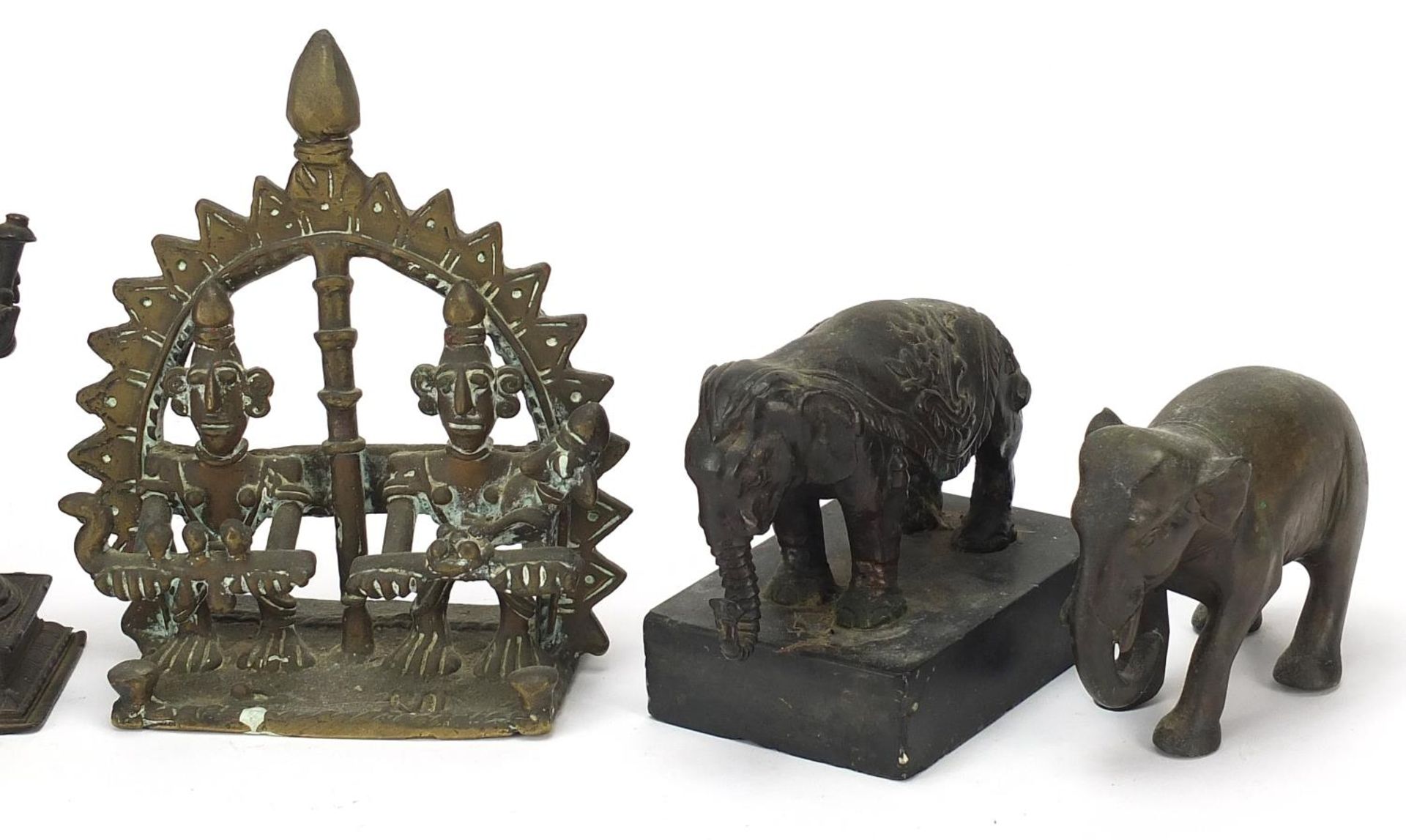 Indian bronzes including votive figures and two elephants, one raised on a rectangular black slate - Image 3 of 9