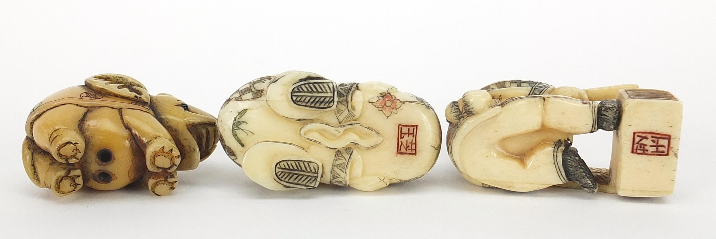 Three Japanese carved ivory netsukes including a elephant, character marks to the bases, the largest - Image 7 of 8