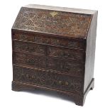 Antique oak bureau carved with flowers, 94cm high x 83cm W x 45cm D