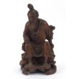 Chinese wood carving of a seated Elder, 26cm high