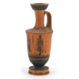 Attic pottery lekythos hand painted with palmettes, 11cm high