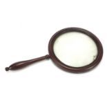 Antique mahogany gallery magnifying glass with turned handle, 32.5cm in length