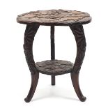 Rosewood table with under tier carved in heavy relief with flowers, 60cm high x 53cm in diameter