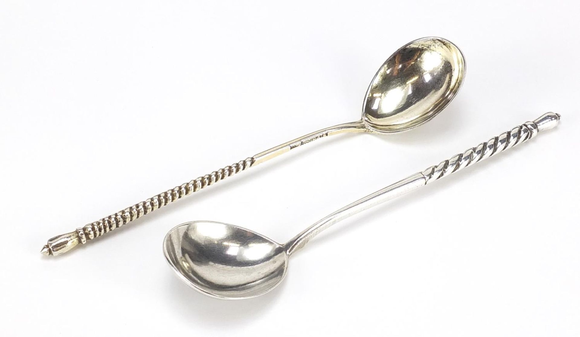Two Russian silver spoons with engraved decoration, impressed marks for Viktor Vasilyevich Savinsky,