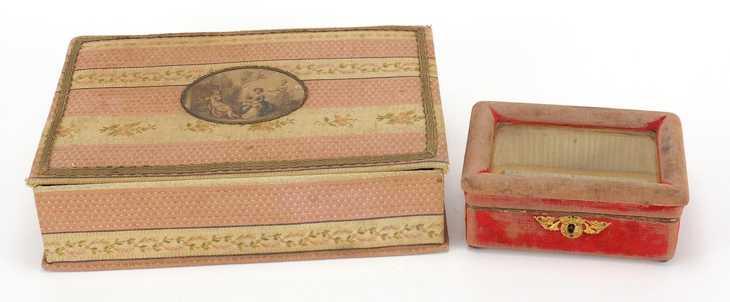 Two 19th century boxes, one with pink and white floral stripes, the smaller one has a glass bevelled