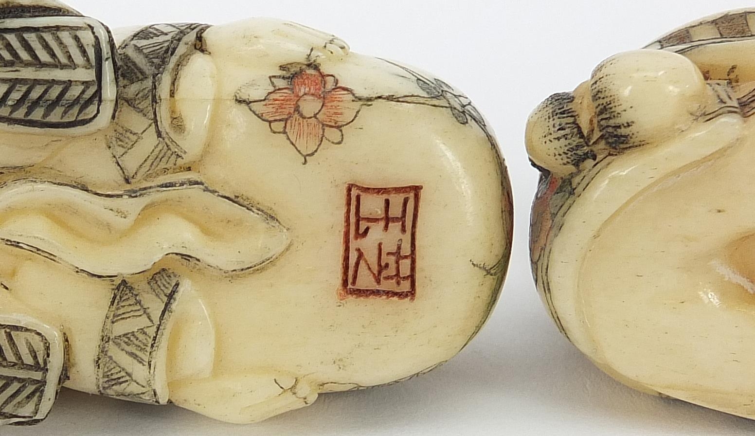 Three Japanese carved ivory netsukes including a elephant, character marks to the bases, the largest - Image 8 of 8